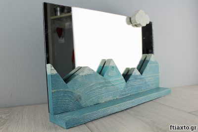 Καθρέπτης και ραφάκι με χιονισμένα βουνά